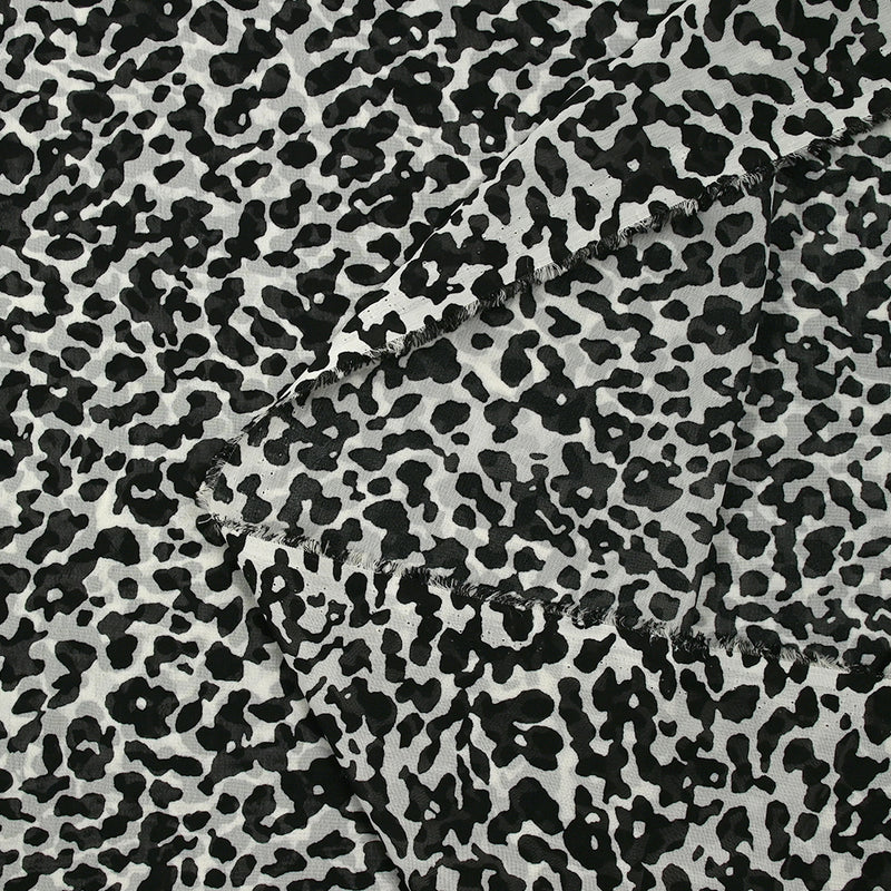 Mousseline imprimée animosité fond blanc