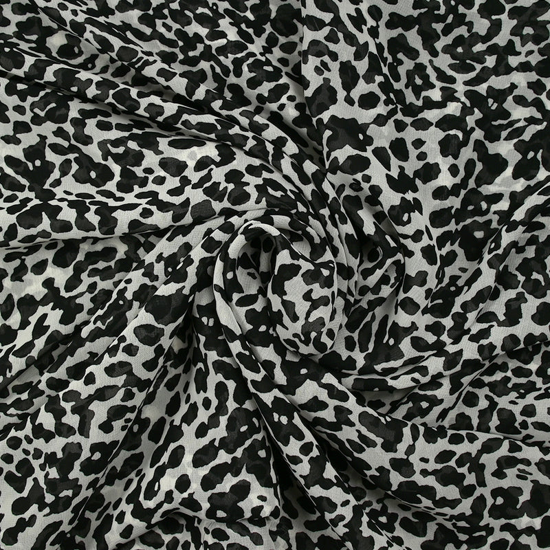 Mousseline imprimée animosité fond blanc