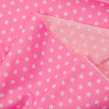 Algodón estampado estrellas 1cm rosa