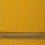 Algodón estampado estrellas 1cm amarillo
