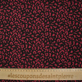 Mousseline imprimée léopard framboise fond noir