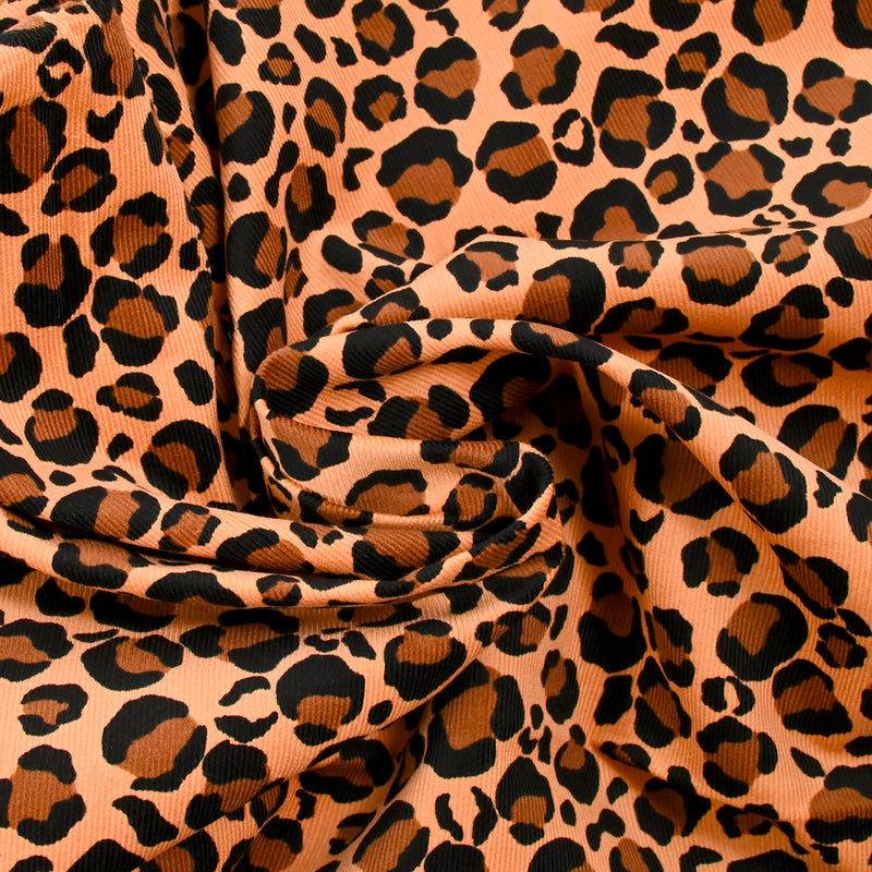 Velours de coton côtelé imprimé léopard fond camel