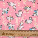 Coton imprimé licorne magique fond rose