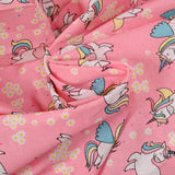 Coton imprimé licorne magique fond rose