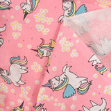 Coton imprimé licorne magique fond rose