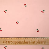 Velours de coton côtelé imprimé cerise fond rose