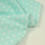 Algodón estampado estrellas 1cm agua