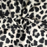 SCUBA Touched Swedish print leopard white background