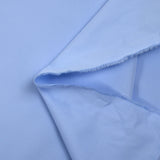 Popeline de coton unie bleu layette