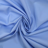 Popeline de coton unie bleu layette