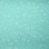 Jacquard nid d'abeille satiné fleurs turquoise et blanc