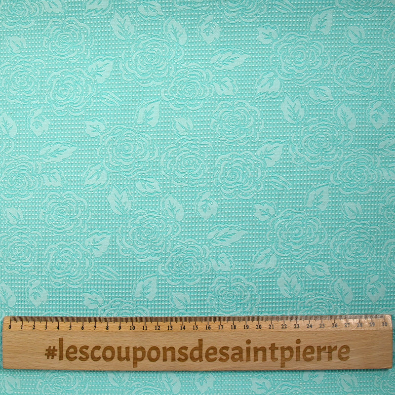 Jacquard nid d'abeille satiné fleurs turquoise et blanc