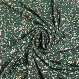 Punto crepé estampado granito con fondo verde oscuro