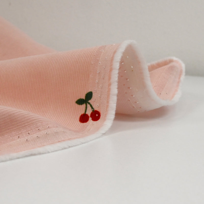 Velours de coton côtelé imprimé cerise fond rose