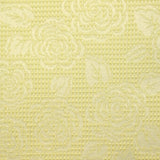 Jacquard nid d'abeille satiné fleurs jaune pâle et blanc