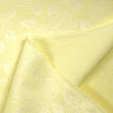 Jacquard nid d'abeille satiné fleurs jaune pâle et blanc