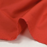 Popeline de coton technique rouge vermillon