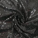 Maille Lurex polyester à paillettes argentées rayées fond noir