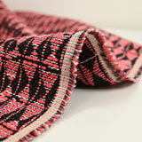 Coral polycotton tweed black background