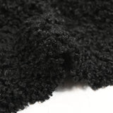 Fausse fourrure Amélie poil mi-long bouclé noir