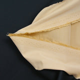 Sergé de coton bleu nuit contrecollé beige