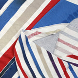 Jersey de viscose imprimé diagonales et paillettes fond bleu