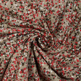 Jersey de polycoton froissé imprimé dans la foule rouge fond beige