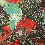 Maille crêpe imprimée ethnique rouge corail fond marron