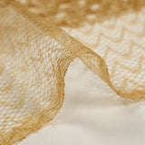 Sequins sur tulle résille ambre