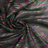 Iridescent rainbow crepe black background