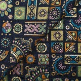 Satin lourd brodé et sequins patchwork fond marine au mètre