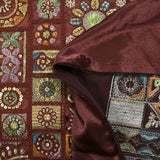 Satin lourd brodé et sequins patchwork fond bordeaux au mètre