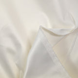 Satin de polycoton élasthanne écru