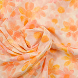 100% cotton veil Plumetis daisy print orange and pink ecru background