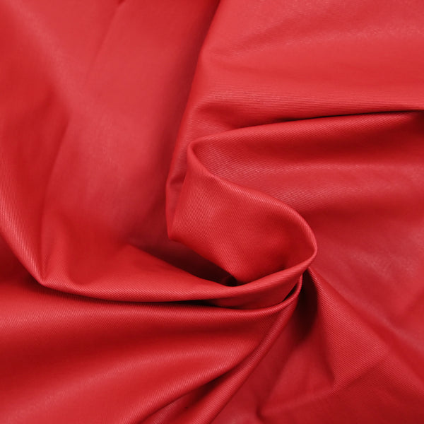 Sergé de coton élasthanne enduit rouge