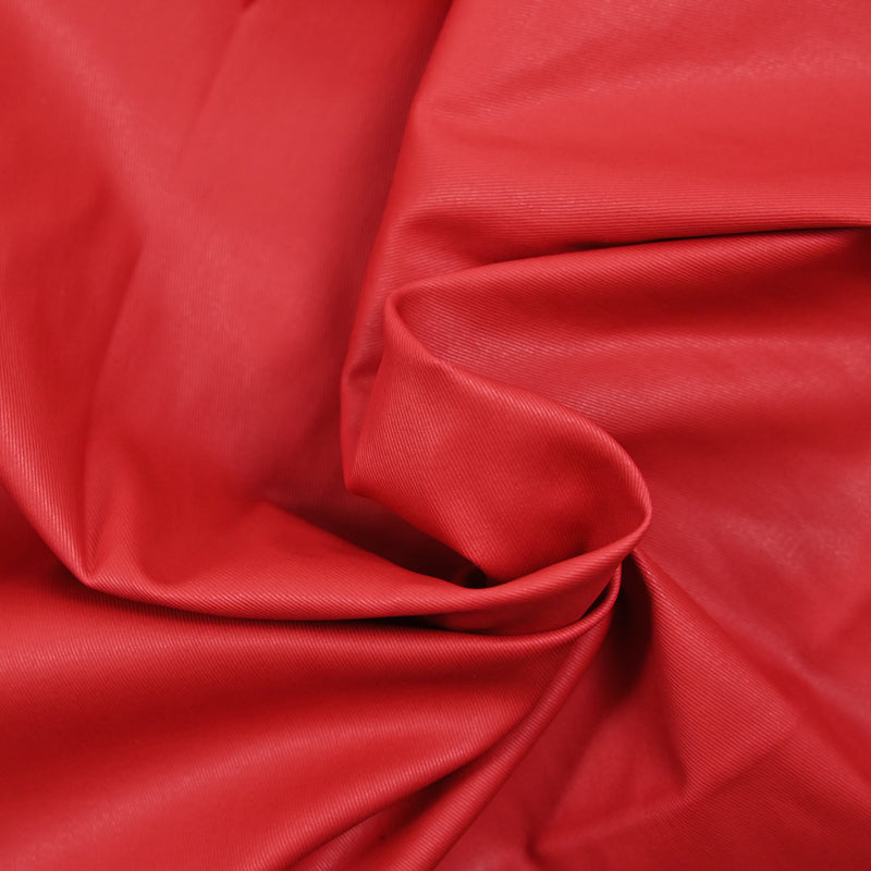 Sergé de coton élasthanne enduit rouge