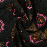 Fausse fourrure sherpa brodée floraison fond noir
