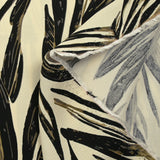 Twill de viscose imprimé feuillage taupe fond écru