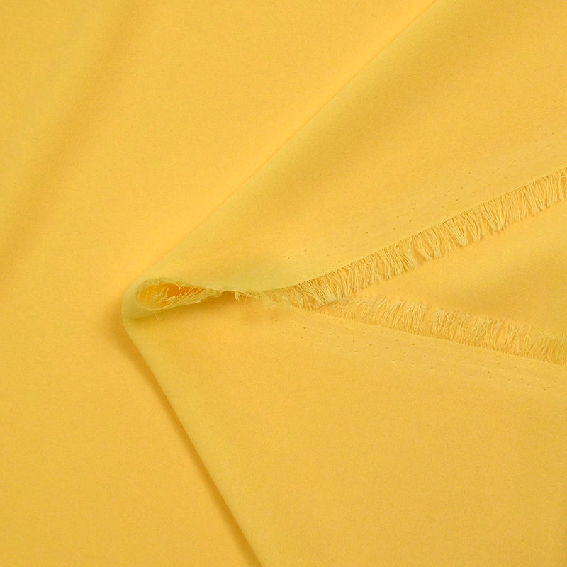 Crêpe georgette polyester jaune tournesol