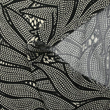 Twill de viscose imprimé nature en pointillés écru et noir