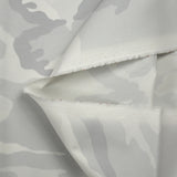 Sergé de coton élasthanne camouflage gris fond blanc