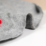 Caban polyester rose rouge feutré fond gris clair