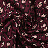 Twill de viscose imprimé léopard graou fond lie de vin