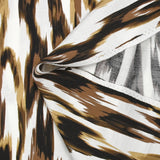 Crêpe viscose imprimé ondes abstraites marron fond blanc