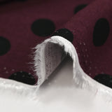 Twill de viscose imprimé à pois fond lie de vin
