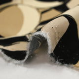 Twill de viscose imprimé cercles fantaisies sable fond écru