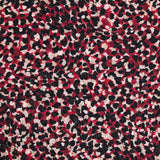 Mousseline de polyester imprimée confettis fond bordeaux