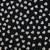 Mousseline de polyester imprimée coeur fond noir
