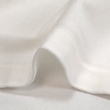 Punto de algodón blanco roto