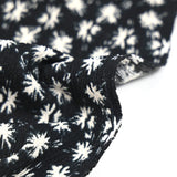 Jersey de polyester crinkle étoile filante fond noir